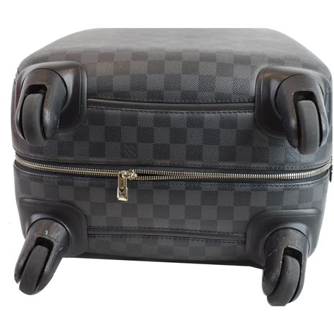 louis vuitton rolling suitcase.